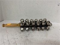 Sleigh Bells on handle. Percussion. 12in L