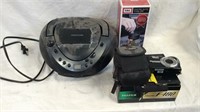 Fuji camera, memorex CD player and digital coin