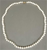 24" strand pearl necklace wit 14K clasp - 7mm