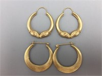 Two pair of 14 karat gold earrings;