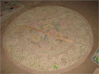 Round handstitched, hand dyed Hook rug