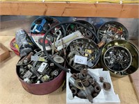 Several tens full of misc. nuts, bolts, etc