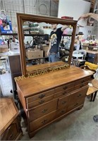 Wood dresser with brass pulls and mirror.  6