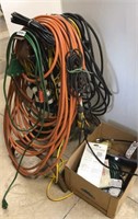 Large lot of extension cords and stand