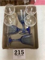 Blue goblets and glass dessert dishes