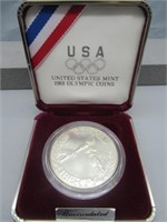1988-D US mint olympic UNC silver dollar.