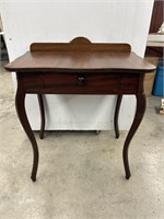 Wooden desk table 27 3/4 long 18 in wide 33 in