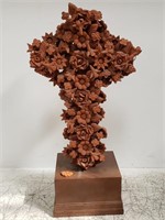 Large terracotta cross on stand