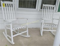 2 White Painted Porch Rocking Chairs. Outside