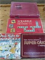 A lot of 4 amazing board games labeled
"The