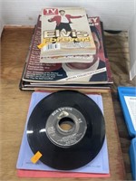 Vintage Elvis records and reading material