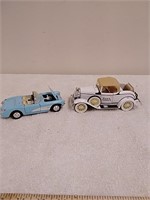 2 1/34 scale diecast cars