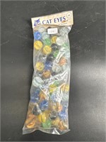 CE BOGARD AND SONS CAIRO WV CAT EYE MARBLES IN BAG