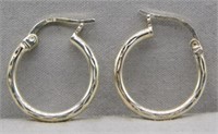 Sterling Silver hoop earrings.