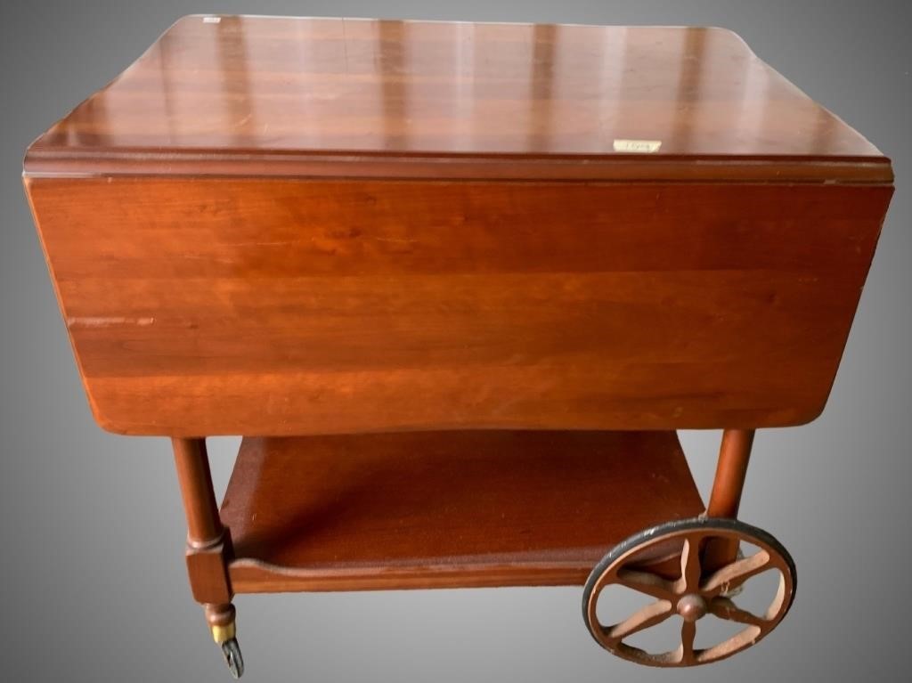 Beautiful vintage wood tea cart on wheels with 2 d