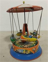 Child's rocket ride spinning toy