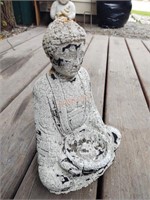 Weathered plaster buddha statue