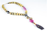 Prayer bead style necklace.
