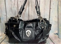 Black leather coach handbag