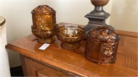 Set of two 6 “ tall amber colored cut glass