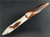 Ancient ivory and bone story knife with heavy f