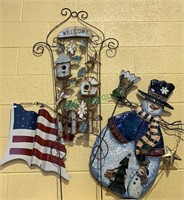 Three metal yard ornaments - snowman, American