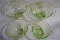 Four Assorted Size Vaseline Glass Mixing Bowls