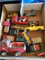 Box lot of
Toy trucks and others
Some Tonka