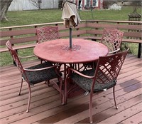 Red metal patio table and chairs
