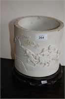 Large biscuit brush pot with relief decorations of