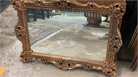 Mirror in Gold Plastic Frame