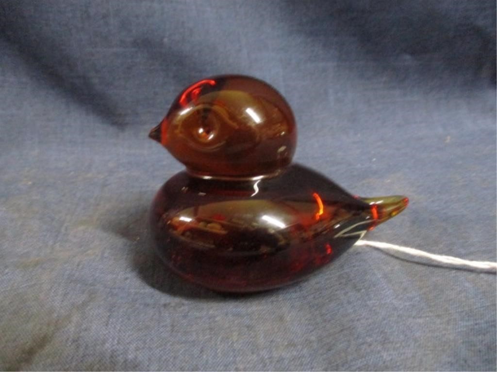 red glass bird paperweight