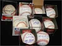 LOT OF 9 BASEBALLS SIGNED BY 7 HALL OF FAMERS.