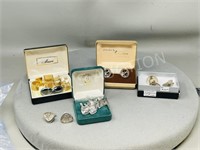 assorted cufflink sets