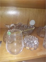 Shelf of mixed glass