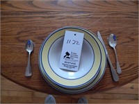 4 place serving of plates, bowls, and utensils