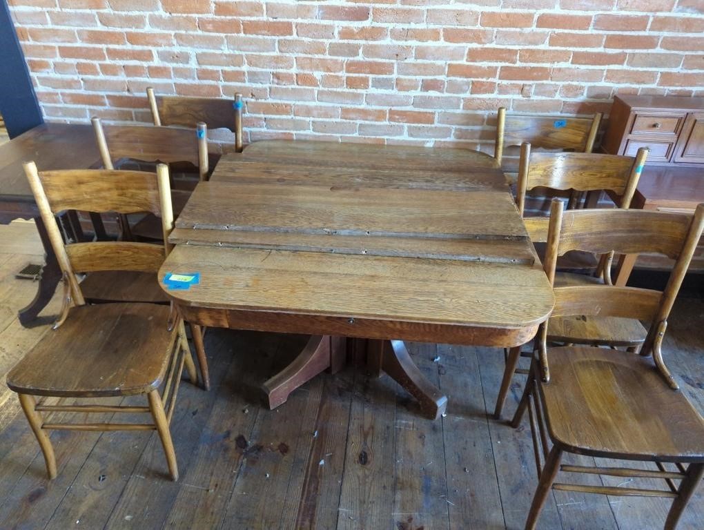 Antique Oak table with 4 leaves & 6 chairs