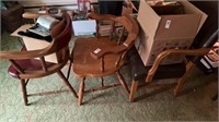 Three wooden chairs no contents on top chairs or