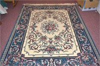 Area Rug - 65 x 90 - does have some staining