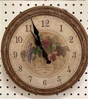 Quartz wall clock measures 12 inches in