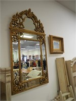 Two wall mirrors: gold gesso shield-shaped