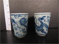 2 SMALL BLUE & WHITE ORIENTAL POTTERY CUPS