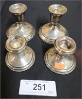 4 Sterling silver candle holders