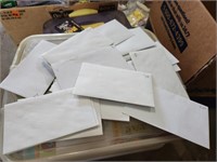 33 Envelopes full of stamps look used