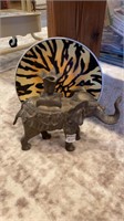 Decorative plate and elephant candle holder.