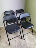 Lot of 4 Black Cushioned Folding Chairs