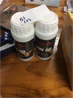 Two bottles of gun oil