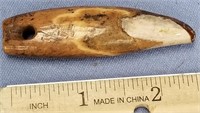 Baby walrus tusk artifact        (f 16)