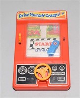 VINTAGE 1978 TOMY DRIVE YOURSELF CRAZY HAND HELD G