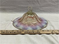 This glass piece could be part of a lamp or a lid